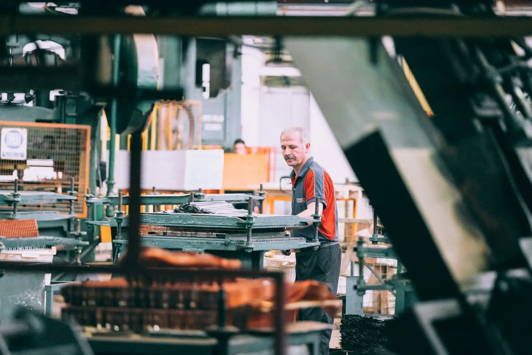 Operator running industrial machinery