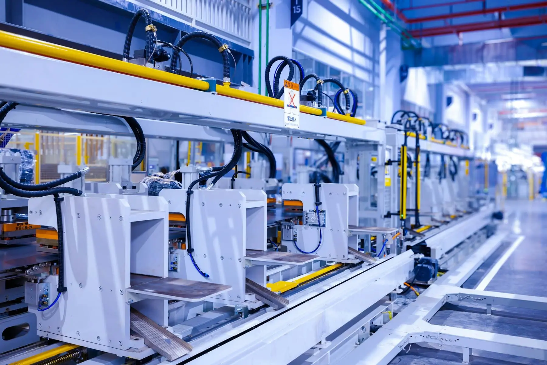 Factory floor with rows of machines