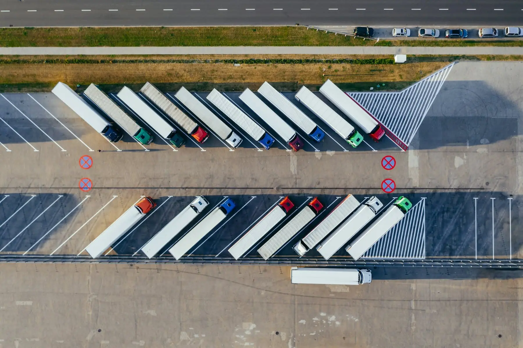 Delivery trucks parked at a distribution yard